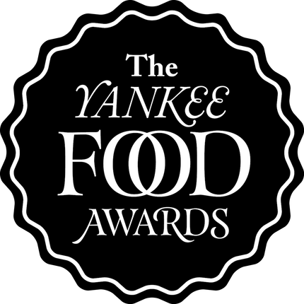 a black medallion logo with the text "the Yankee Food Awards" inside