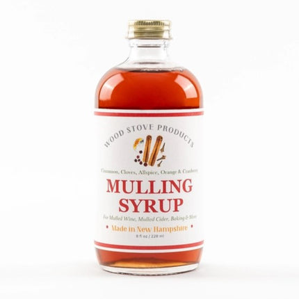 8oz mulling syrup bottle showing the warm colored amber liquid inside