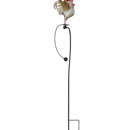 the whole photo of A metal garden stake featuring a colorful rooster with detailed feathers, perched on a rocker that moves in the wind.