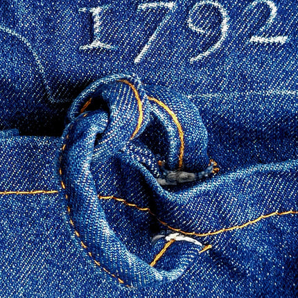 a close up of the pocket tie on the gathering apron