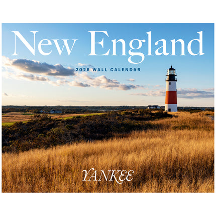 Yankee 2026 New England wall calendar with a lighthouse on a grassy field.