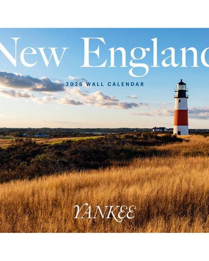 Yankee 2026 New England wall calendar with a lighthouse on a grassy field.