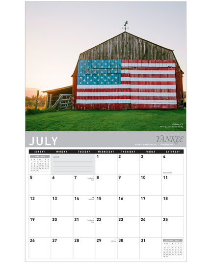 Calendar page for July showing a barn with an American flag design.