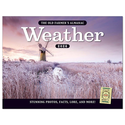 the cover of The Old Farmer's Almanac Weather 2026 calendar featuring an icy wheat field with a charming windmill in the background
