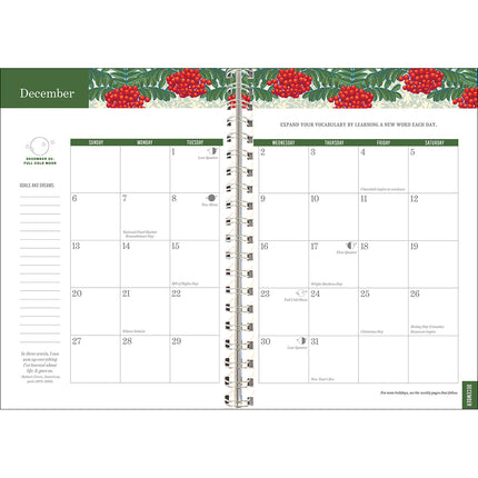 Interior page of the Old Farmer's Almanac planner showing the December page with full calendar, space for notes on the side, and charming red berry illustration at the top of the pages