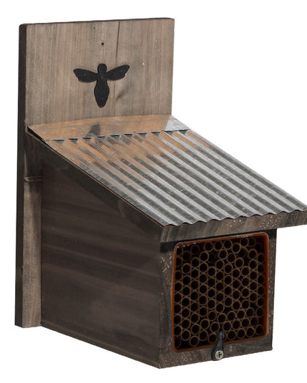 The rustic mason bee house with 94 nesting tubes, corrugated metal roof, and bee emblem