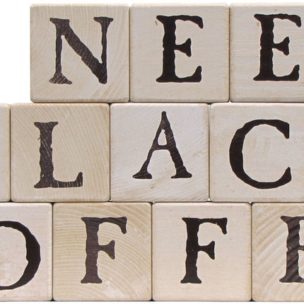 3 rows of stacked blocks spelling out "I need black coffee"