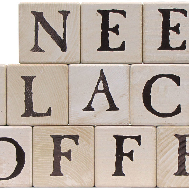 3 rows of stacked blocks spelling out "I need black coffee"