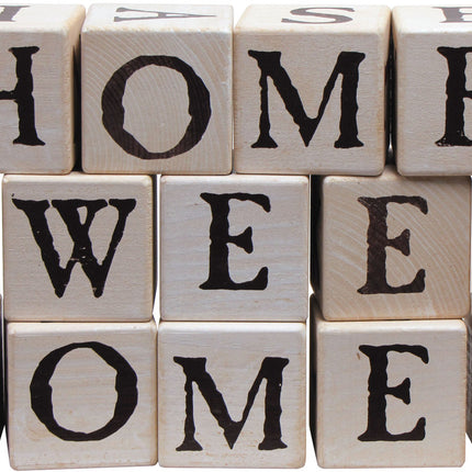 3 rows of stacked blocks spelling out "Home Sweet Home"