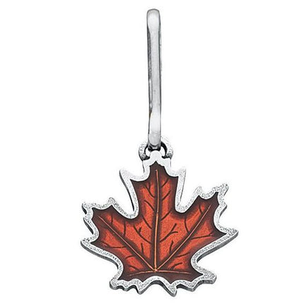 a handcrafted pewter and rust orange colored maple leaf zipper pull on a white background