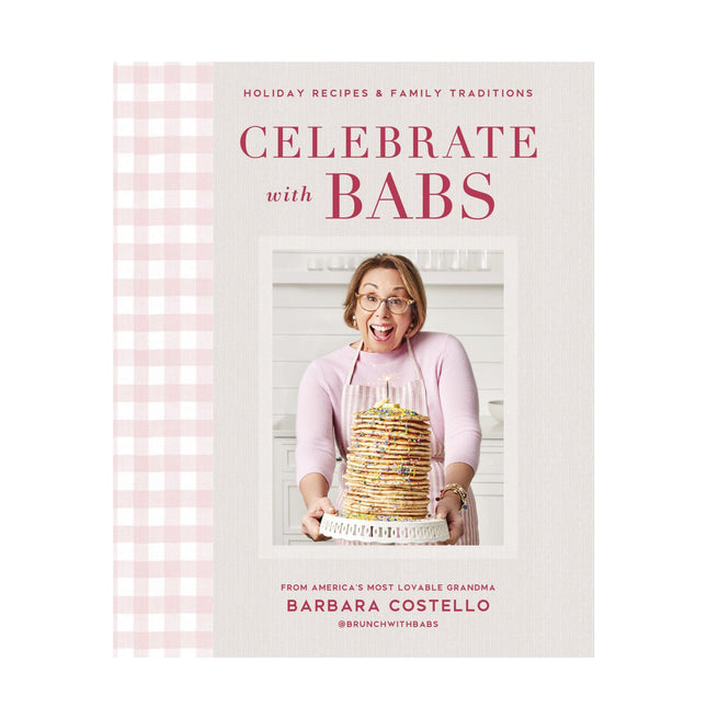 Book cover of 'Celebrate with Babs' featuring a woman holding a stack of pancakes.