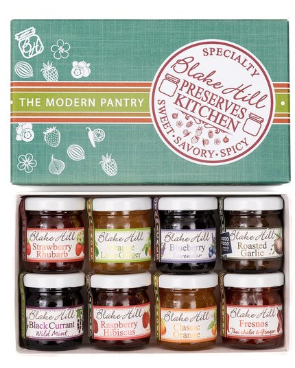 top down view of the eat love jam box with the lid removed to show the variety of jams included in the gift box