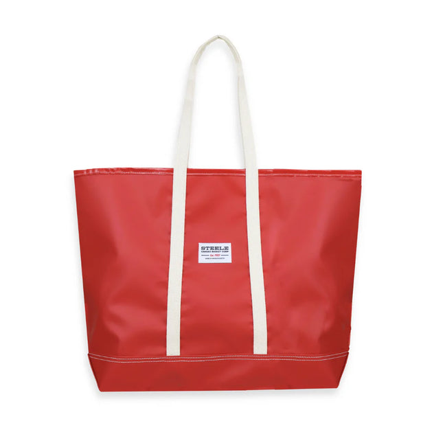 Red tote bag with white handles on a white background