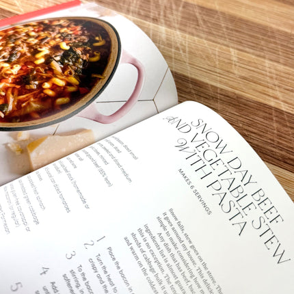 Open cookbook showing a recipe for Snow Day Beef and Vegetable Stew with Pasta