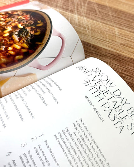 Open cookbook showing a recipe for Snow Day Beef and Vegetable Stew with Pasta