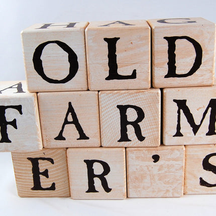 3 rows of stacked blocks spelling out "old farmer's"