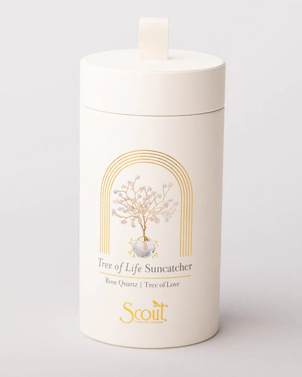 White cylindrical container with 'Scout' branding and 'Tree of Life Suncatcher' design on a light gray background