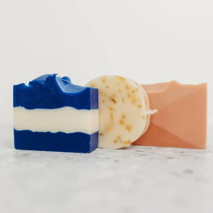 the three soaps in the Day at the Beach gift set: Ultramarine, Sunshine Citrus, and Beach Rose