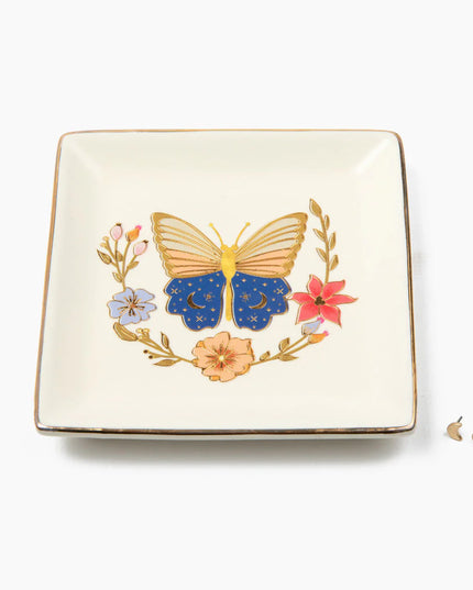 Decorative square plate with a butterfly and floral design on a white background