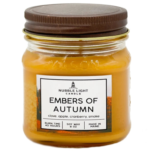 Jar candle labeled 'Embers of Autumn' by Nubble Light Candle on a white background