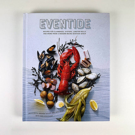 Cookbook titled 'Eventide' with seafood imagery on a light background