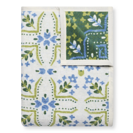 Floral patterned blanket on a white background