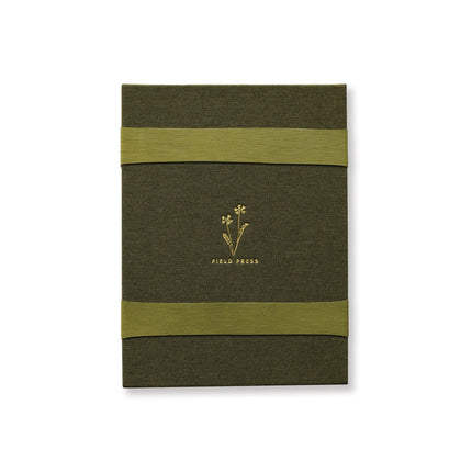the field press unpackaged showing the linen cover and two heavyweight bands