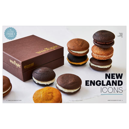 a spread with the text "New England Icons" on an image of various stacked whoopie pies in front of an elegant brown box with the text "whoopie" printed on it
