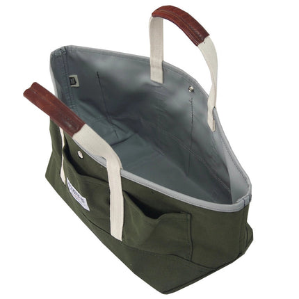 an above angle view of the tote shown empty to feature the interior space of the tote