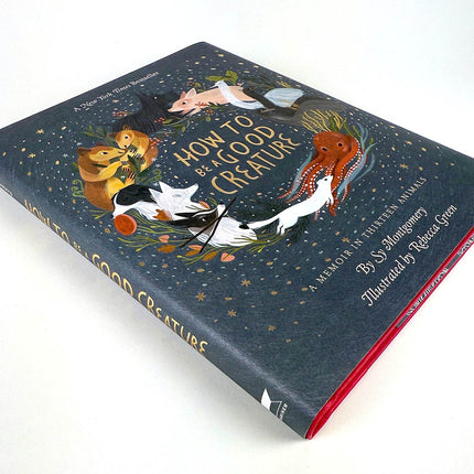 Book titled 'How to Be a Good Creature' with animal illustrations on a white background