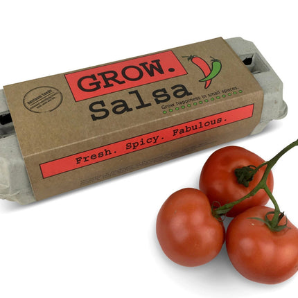 The Grow Salsa garden kit in package alongside a cluster of fresh tomatoes