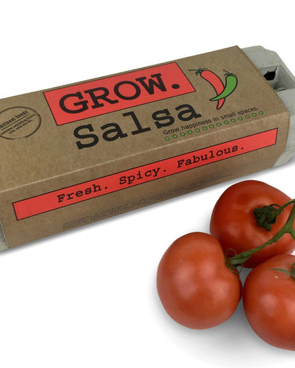 The Grow Salsa garden kit in package alongside a cluster of fresh tomatoes