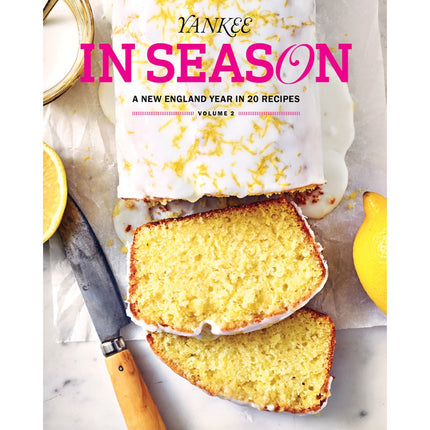 Front cover of the book Yankee in Season: A New England Year in 20 Recipes, Volume 3, featuring a loaf of lemon cake with two slices, lemon halves, and a knife on white marble and parchment paper.