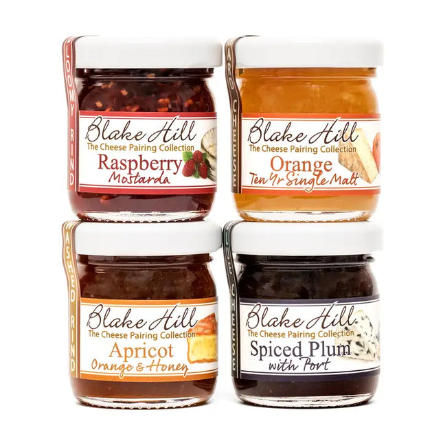 Four jars of Blake Hill cheese pairing collection on a white background