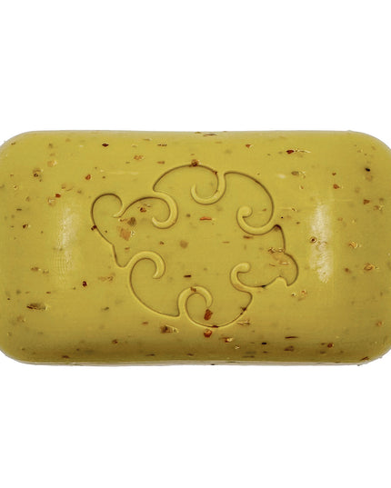a close up of the Sea Loofa soap showing the kelp green color of the soap bar and the texture of the exfoliating seaweed throughout