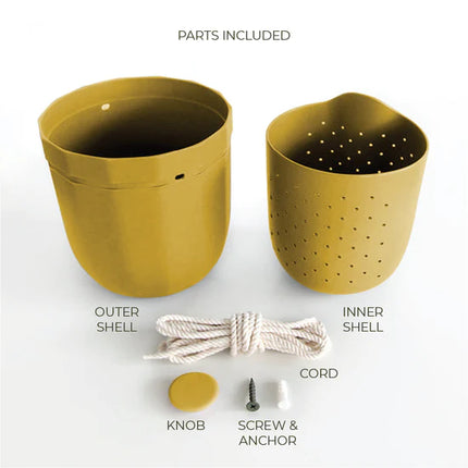 the mustard loop planter and all of its parts and pieces: outer shell, inner shell, knob for the wall, screw and anchor, and hanging cord