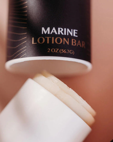 close up of the Marine Lotion Bar packaging shown open revealing the product