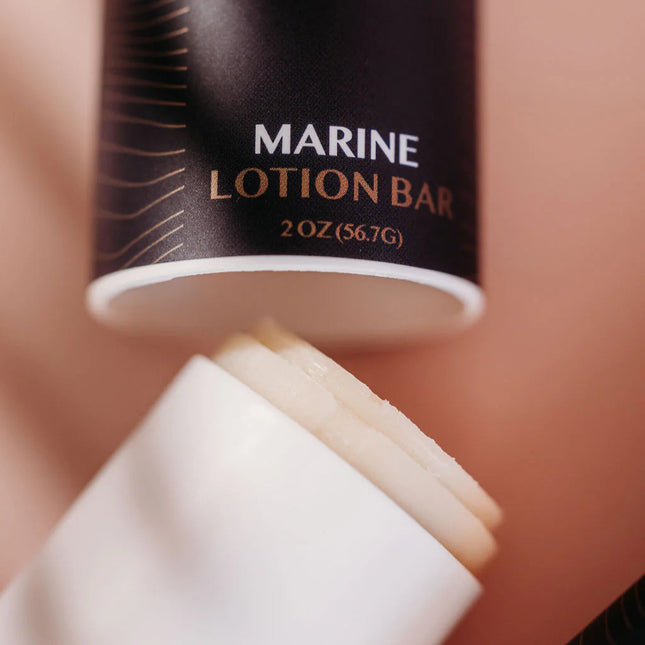 close up of the Marine Lotion Bar packaging shown open revealing the product