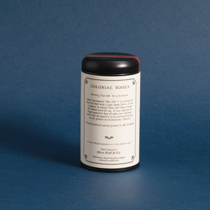 Tea canister with label on a blue background
