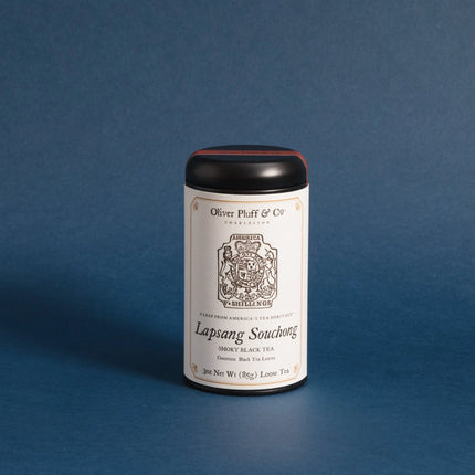 Tea canister with label on a blue background