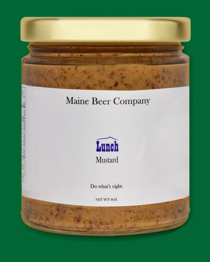 a jar of Maine Beer company Lunch Mustard in glass jar with gold lid