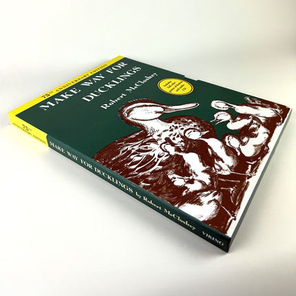 Book titled 'Make Way for Ducklings' by Robert McCloskey on a white background
