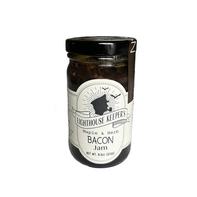 a jar of maple and herb bacon jam with a white label with a logo of a silhoutted man in a captain's hat smoking a pipe with seagulls flying behind him