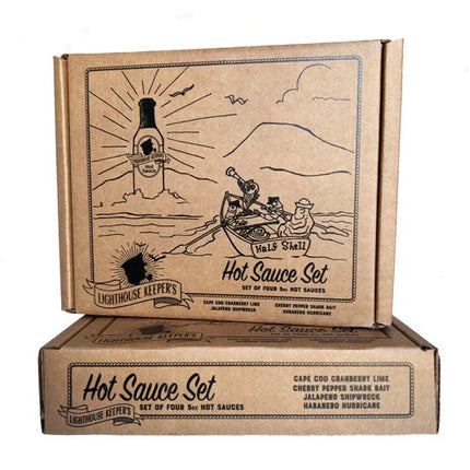 the hot sauce gift set box showing a sea scene with people in a rowboat headed toward a bottle of hot sauce on the horizon that shines like a lighthouse