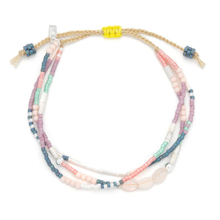 Multicolored beaded bracelet on a white background