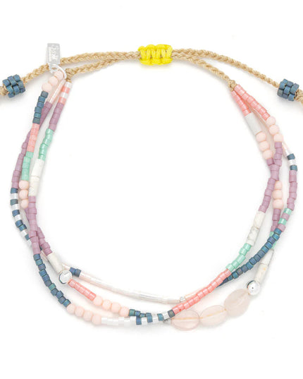Multicolored beaded bracelet on a white background