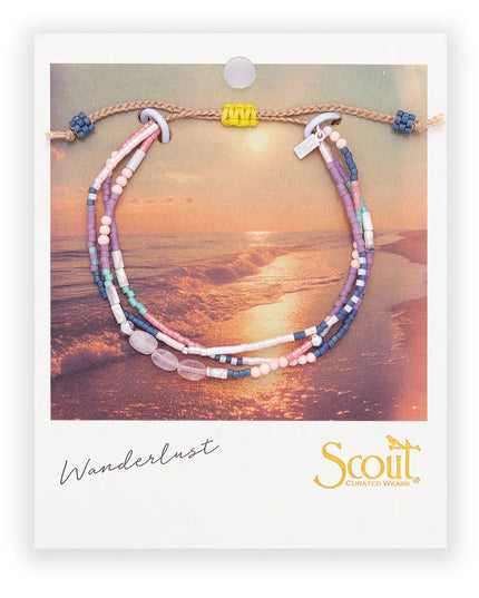 Multistrand beaded bracelet on Scout branded card with sunset beach background