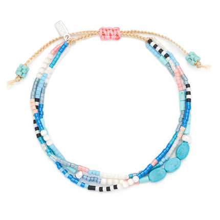 Colorful beaded bracelet on a white background
