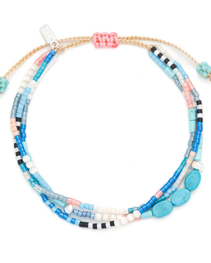 Colorful beaded bracelet on a white background