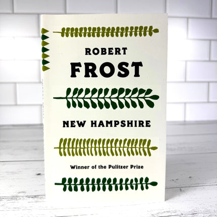 Book titled "Robert Frost, New Hampshire' on a white background.